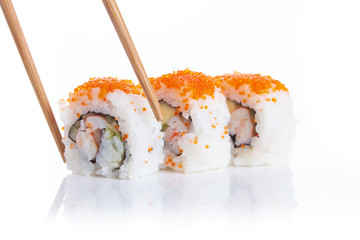 Roll Sushi California makis and chopsticks