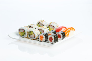 Isolated Sushi plate on white background © Rojo