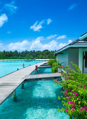Maldives water bungalow on ocean water landscape