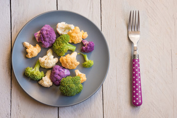 Cut cauliflower of different types and different colors