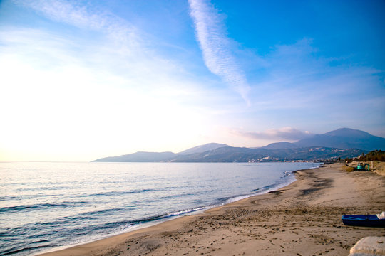 dirty beach with mountains