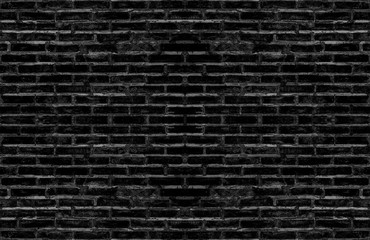 dirty old black brick textured wall for dark tone vintage interior design background. or brick mapping for 3d texture.