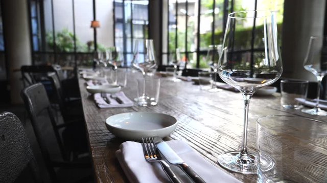 Empty Glasses, Plates, Forks, Knives Serving For Dinner In Restaurant. Table Layout. Serving.