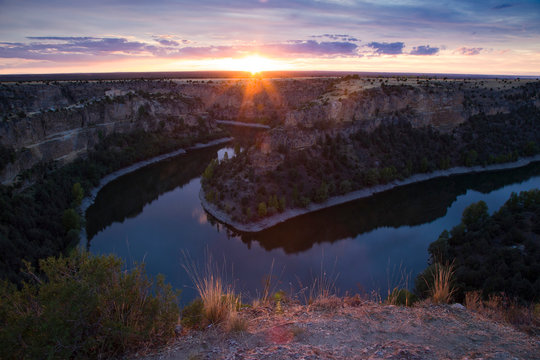 Hoces del Durat&oacute;n, Segovia, Spain. Landscape fron San Frutos. with flere effect of sunset.
