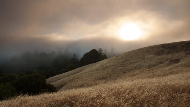 Foggy Sunset over Rolling Hills Panning Timelapse 4k