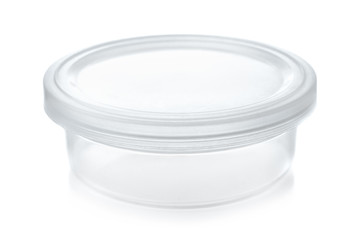 Small transparent round plastic container