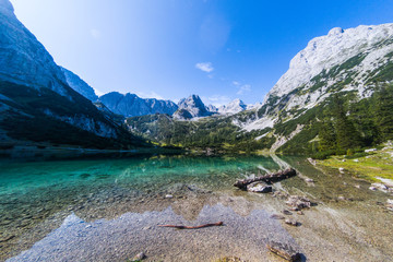 Wonderful autumn day in Seebensee Lake with Zugspitze Mountain in the background - Ehrwald, Tyrol - Austria