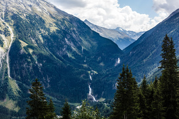 Obraz premium Panoramic view of beautiful mountain landscape in the Bavarian Alps with village of Berchtesgaden and Watzmann massif in the background at sunrise, Nationalpark Berchtesgadener Land, Bavaria, Germany