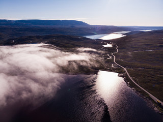 Road crossing Hardangervidda plateau, Norway. Aerial view.