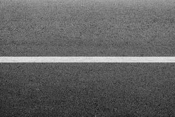Fototapeta premium New asphalt texture with white dashed line