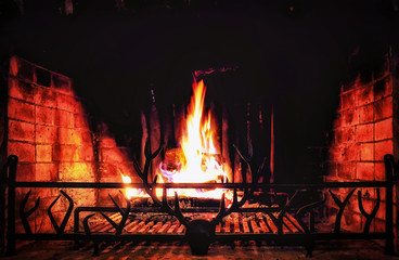 firewood in beatiful vintage fireplace