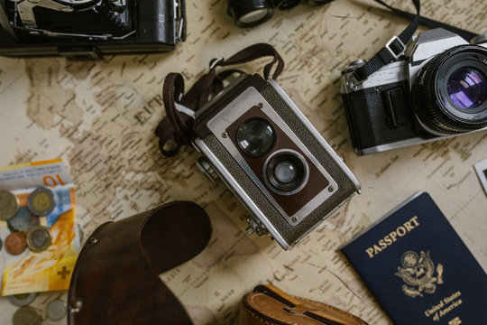 vintage map, antique  film cameras and passport 
