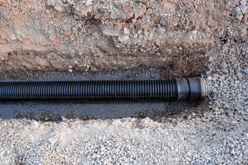 Buried Sewer Line in Road Construction Water Main Tubing Piping Water Infastructure Plumbing
