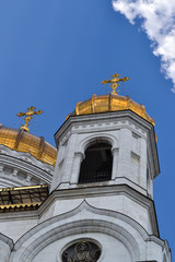 Beautiful building of the Russian Orthodox Church. Covered in gold dome. Crosses and exterior decoration. Love to God