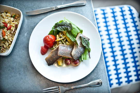 Zoodles with Trout, Carrot-top Pesto and Roasted Tomatoes and Couscous