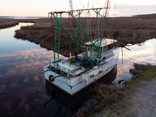 Fototapeta premium Aerial View of an Abandoned Fishing Boat in Eastern NC