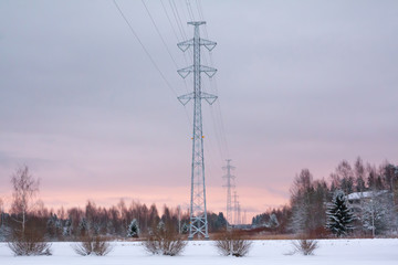 Power line at winter evening in Kouvola, Finland