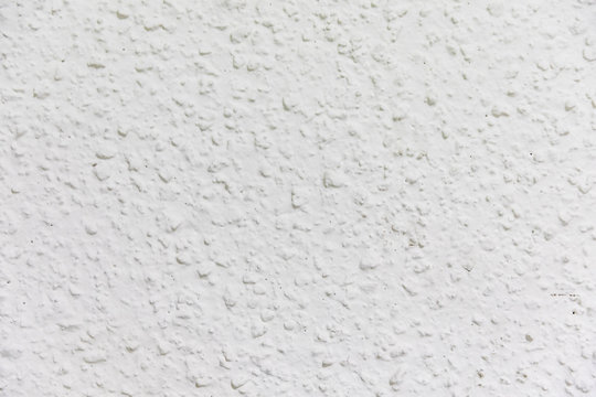 White wall painted with gotele technique