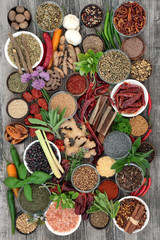 Spice and herb food seasoning collection with fresh and dried spices and herbs Top view.