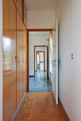 Long corridor in country house interior