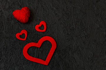 Red hearts on February 14, Valentine's Day on a black background. Valentines day greeting card