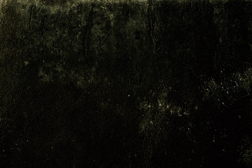 Grungy dark green wall background or texture