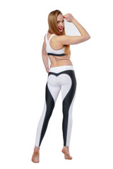 Young attractive woman in fitnes wear