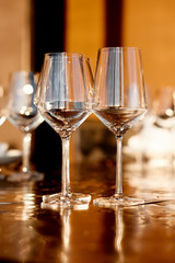 Empty glass goblets for red and white wine  in the restaurant