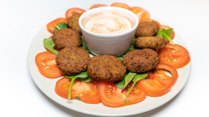 Falafel on plate with salad
