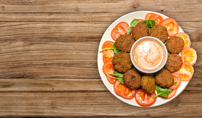 Falafel on plate with salad