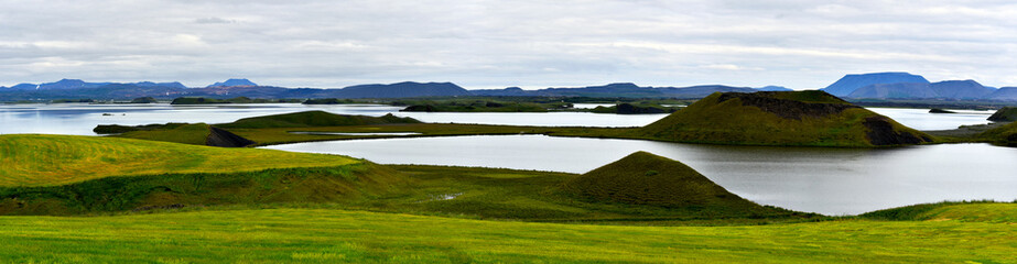 Obraz premium Panorama of Myvatn lake with islets of volcanic pseudocraters in Northern Iceland.