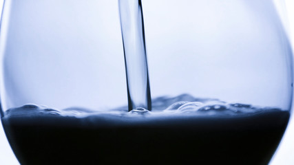 Pouring glass water. Fresh, cold drinking, drop, bubbles. Healthy water close up shot. 