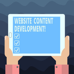 Writing note showing Website Content Development. Business photo showcasing process of issuing info that readers find useful Hu analysis Hand Holding Tablet Smartphone Display Unit photo