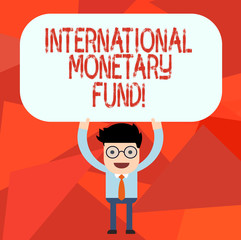 Conceptual hand writing showing International Monetary Fund. Business photo text promotes international financial stability Man Holding Above his Head Blank Rectangular Colored Board