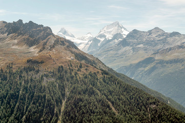 Mountains of the Swiss Alps in the Saint Luc valley on a sunny day.