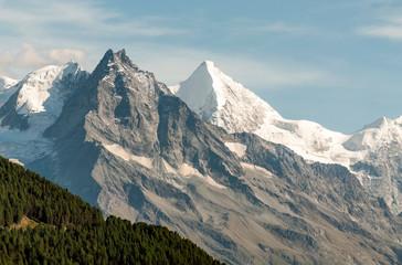 Mountains of the Swiss Alps in the Saint Luc valley on a sunny day.
