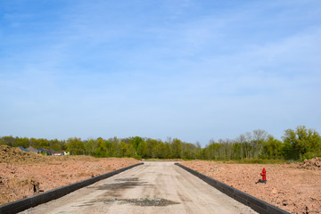 New Road Construction in Suburban New Housing Development
