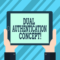 Text sign showing Dual Authentication Concept. Conceptual photo Need two types of credentials for authentication Hu analysis Hand Holding Blank Screen Tablet Smartphone Display Unit photo