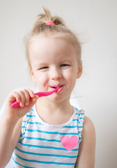 Happy Little Girl Brushing Her Teeth, Pink Toothbrush, Dental Hygiene, Morning Night Healthy Concept Lifestyle