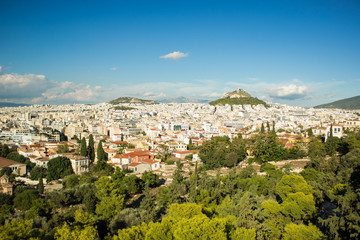 big European city panoramic view from above colorful bright summer landscaping place from above with lonely mountain on horizon