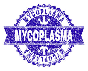 MYCOPLASMA rosette stamp seal watermark with grunge style. Designed with round rosette, ribbon and small crowns. Blue vector rubber watermark of MYCOPLASMA caption with unclean style.