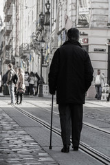 old man walking on the street