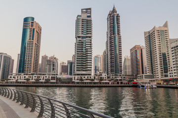 Fototapeta na wymiar DUBAI, UAE - MARCH 12, 2017: High rise buildings of Dubai Marina,