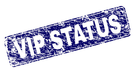 VIP STATUS stamp seal print with distress texture. Seal shape is a rounded rectangle with frame. Blue vector rubber print of VIP STATUS title with grunge texture.