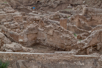 Ruins of ancient settlements near Bahrain Fort (Qal'at al-Bahrain) in Bahrain - obrazy, fototapety, plakaty