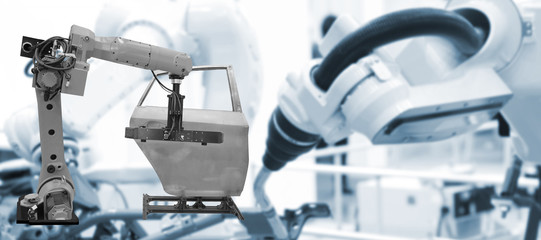 robot is working  in the automotive industry smart factory background