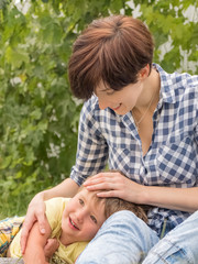 Child meeting with working mother. Working parents. Woman's happiness background. Working woman....