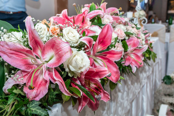 Colorful wedding table flowers. Wedding decoration or setting for wedding party in restaurant.