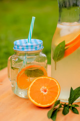 Fresh aromatic water orange and mint leaf
