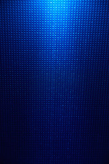 Ray of white light on a blue background to a point
